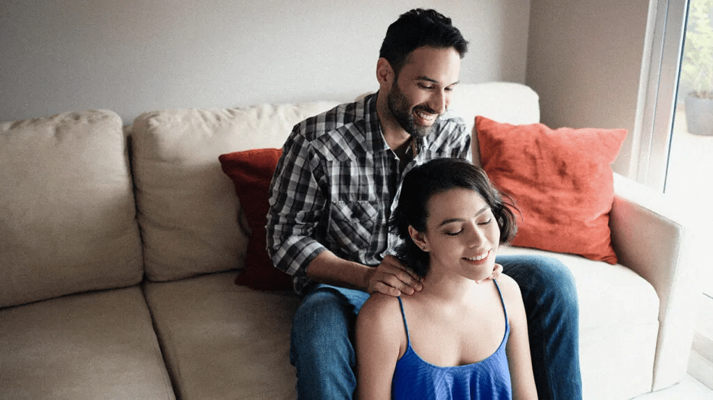 Man Massaging Woman